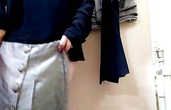 OMG! Russian mommy trying on skirts in a fitting room